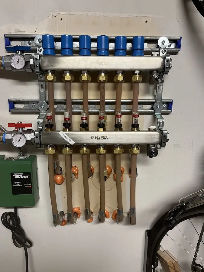 Plumber performing Gas Leak Detection at a residential property in Justice